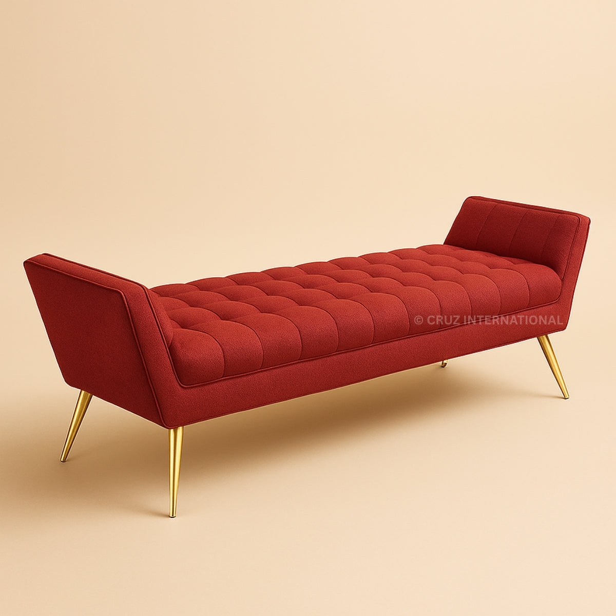 Red tufted bench with gold legs on a beige background